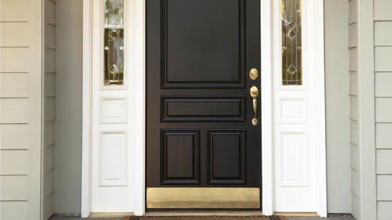 Black door with gold accents